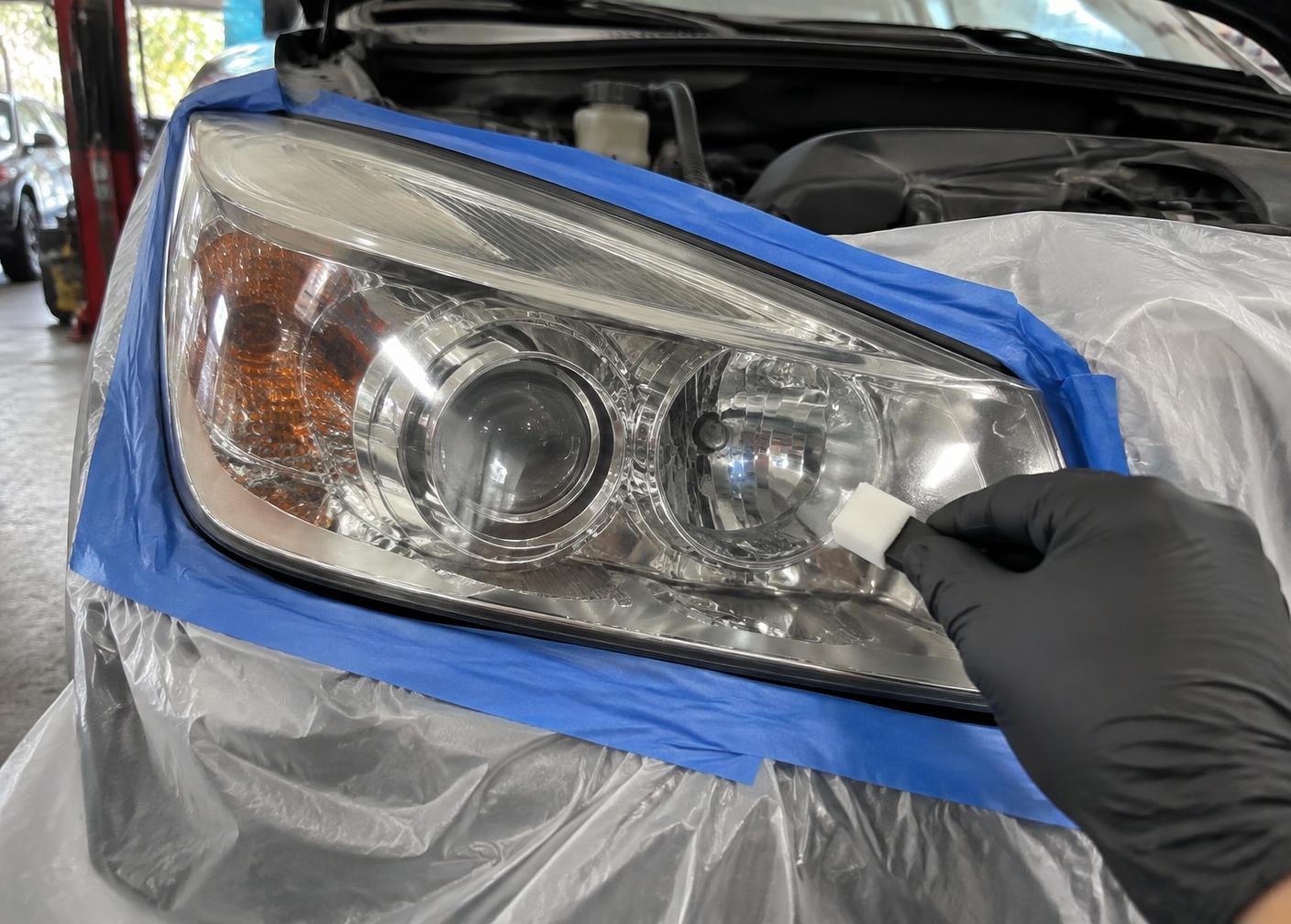 Protective coating applied to a restored headlight