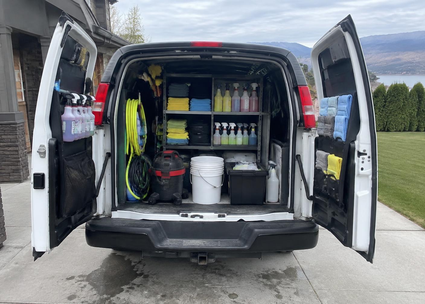 Organized equipment prepared for a mobile detailing appointment