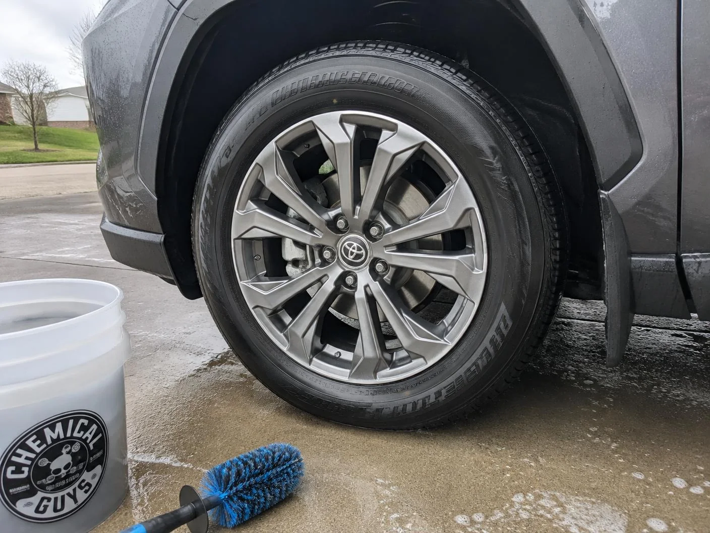 Freshly cleaned alloy wheel and dressed tyre on an SUV