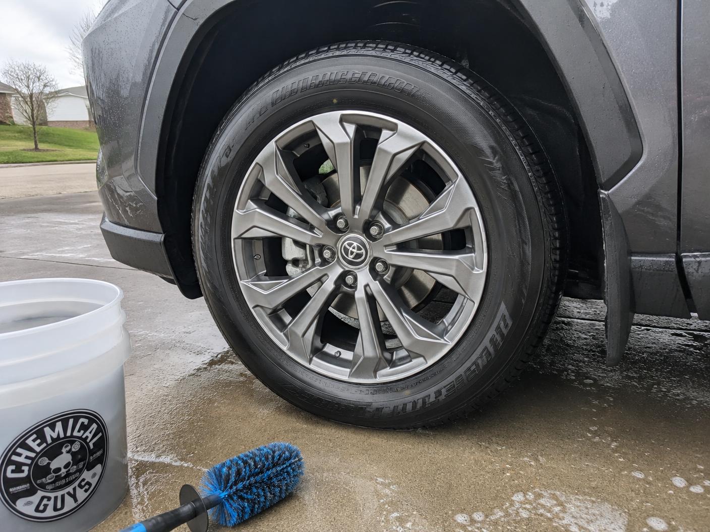 Freshly cleaned alloy wheel and dressed tyre on an SUV