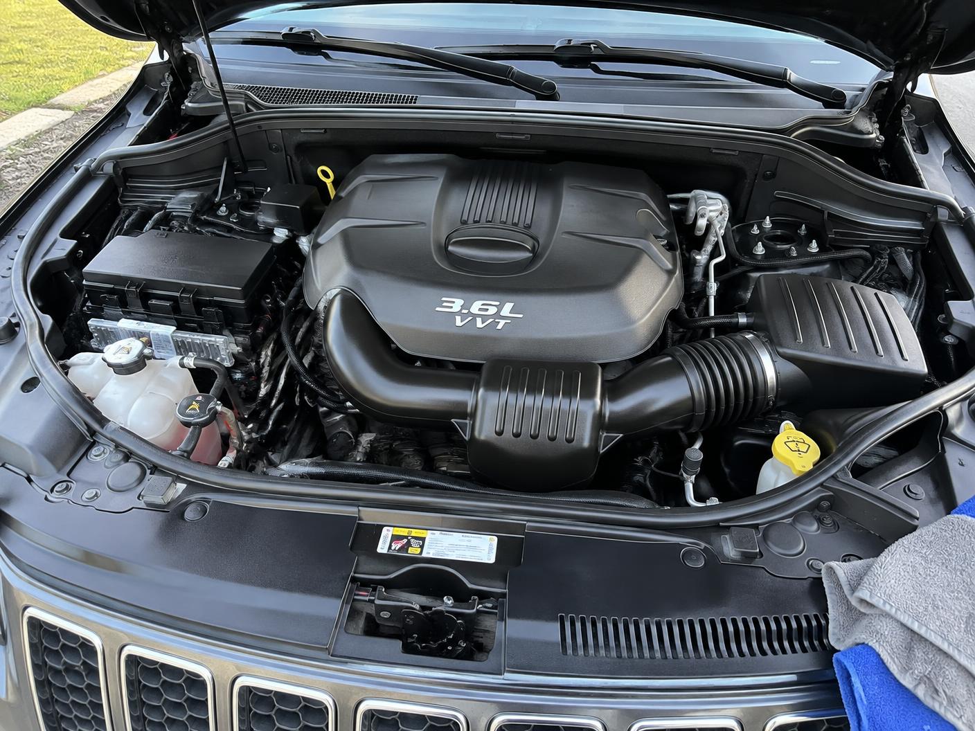 Cleaned and dressed engine bay of an SUV