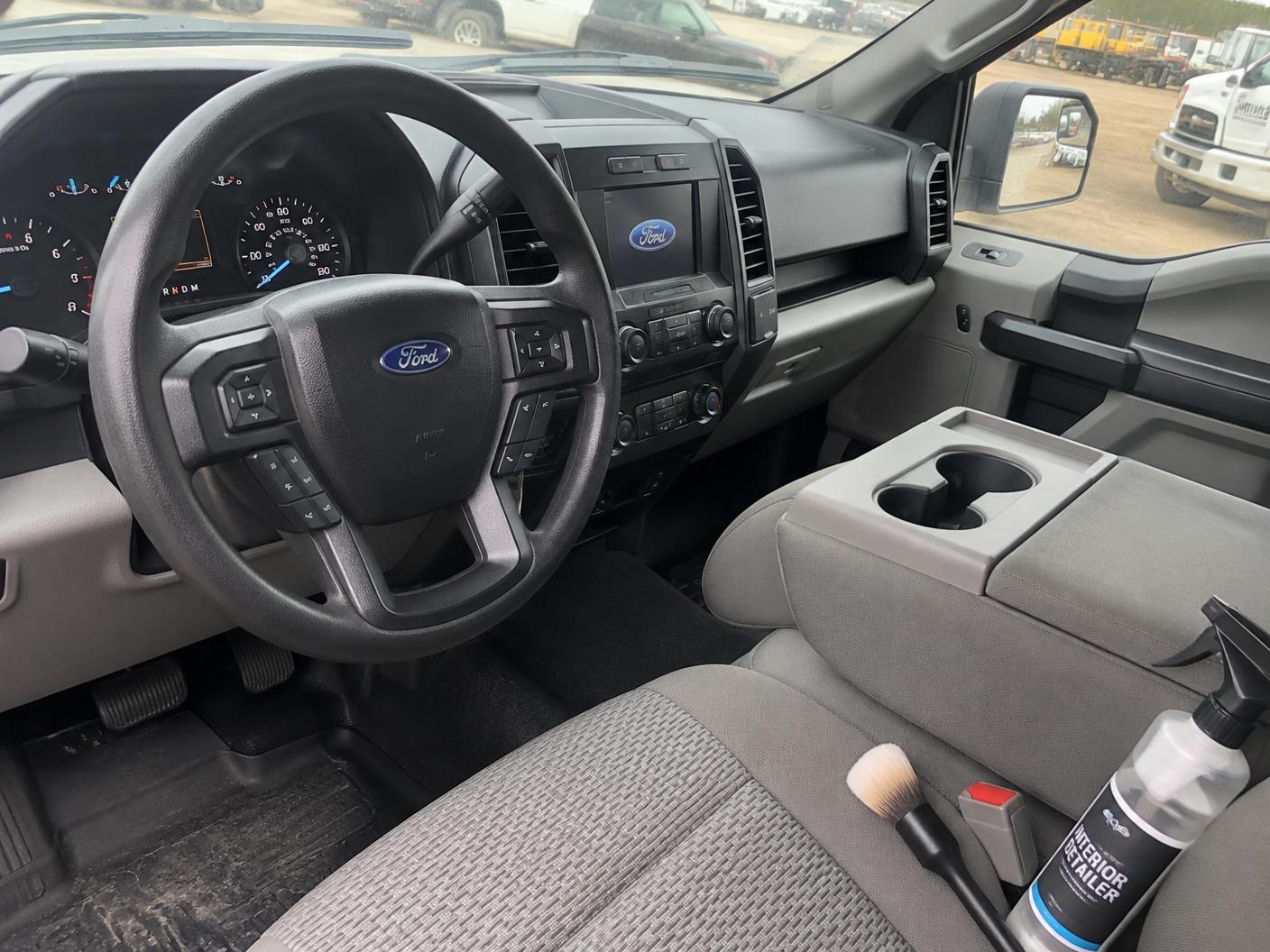 Cleaned dashboard and console of a work truck