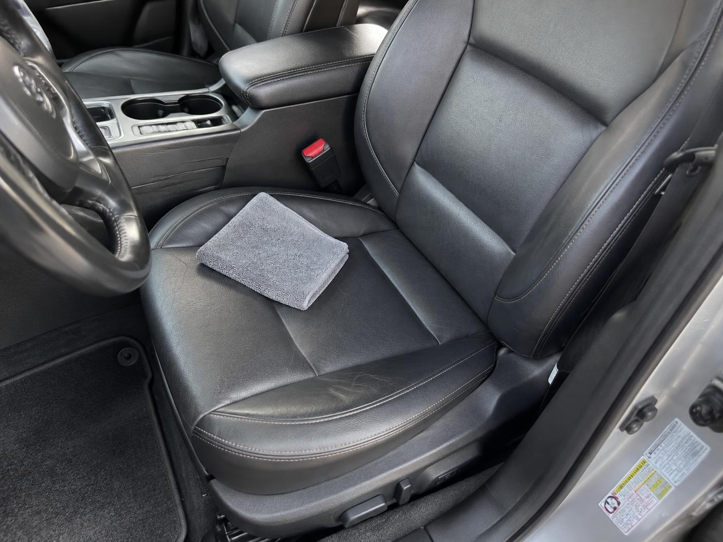 Clean conditioned leather seats in a used sedan