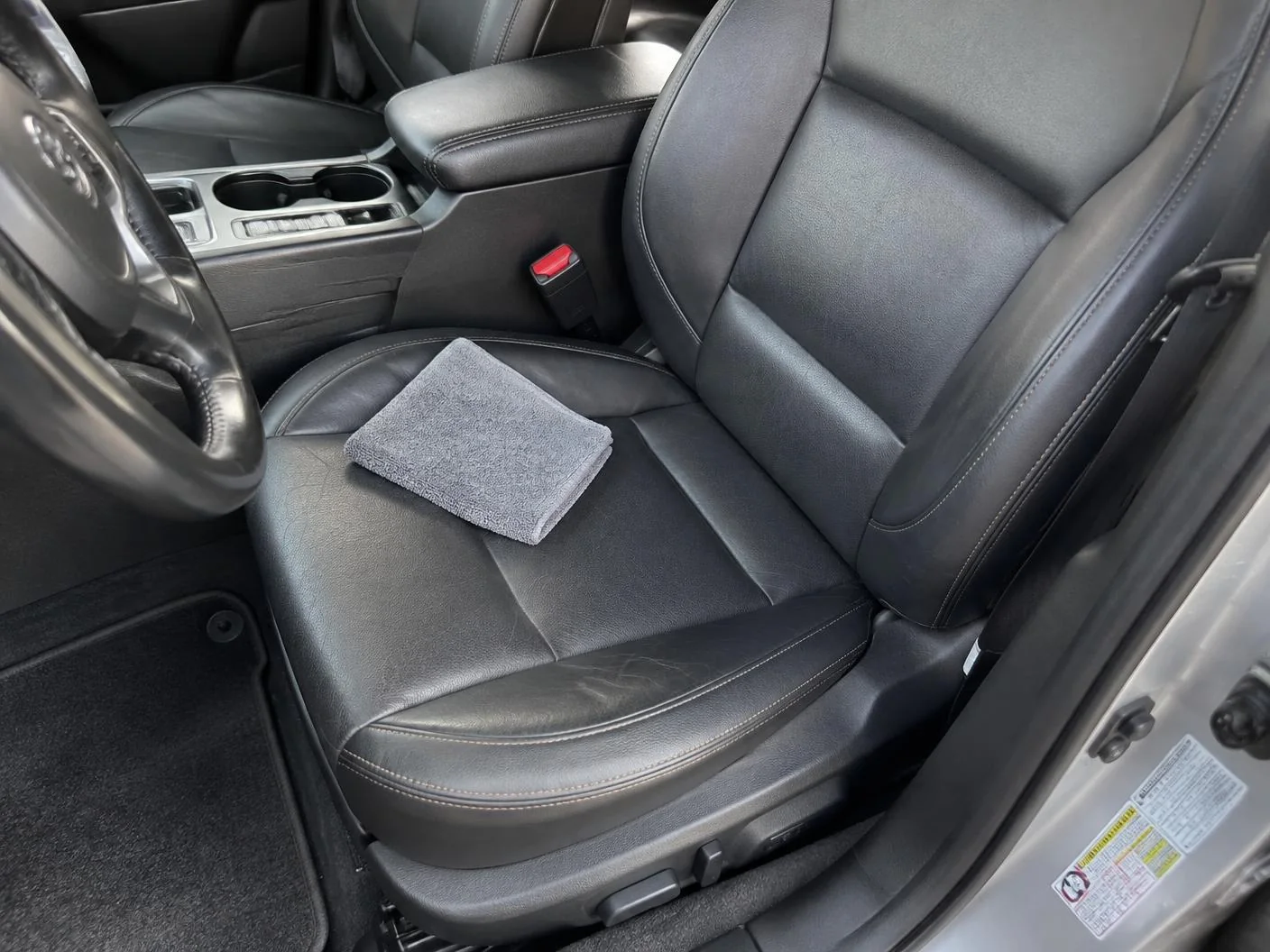Clean conditioned leather seats in a used sedan